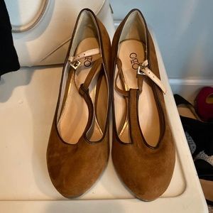 Brown suede pumps